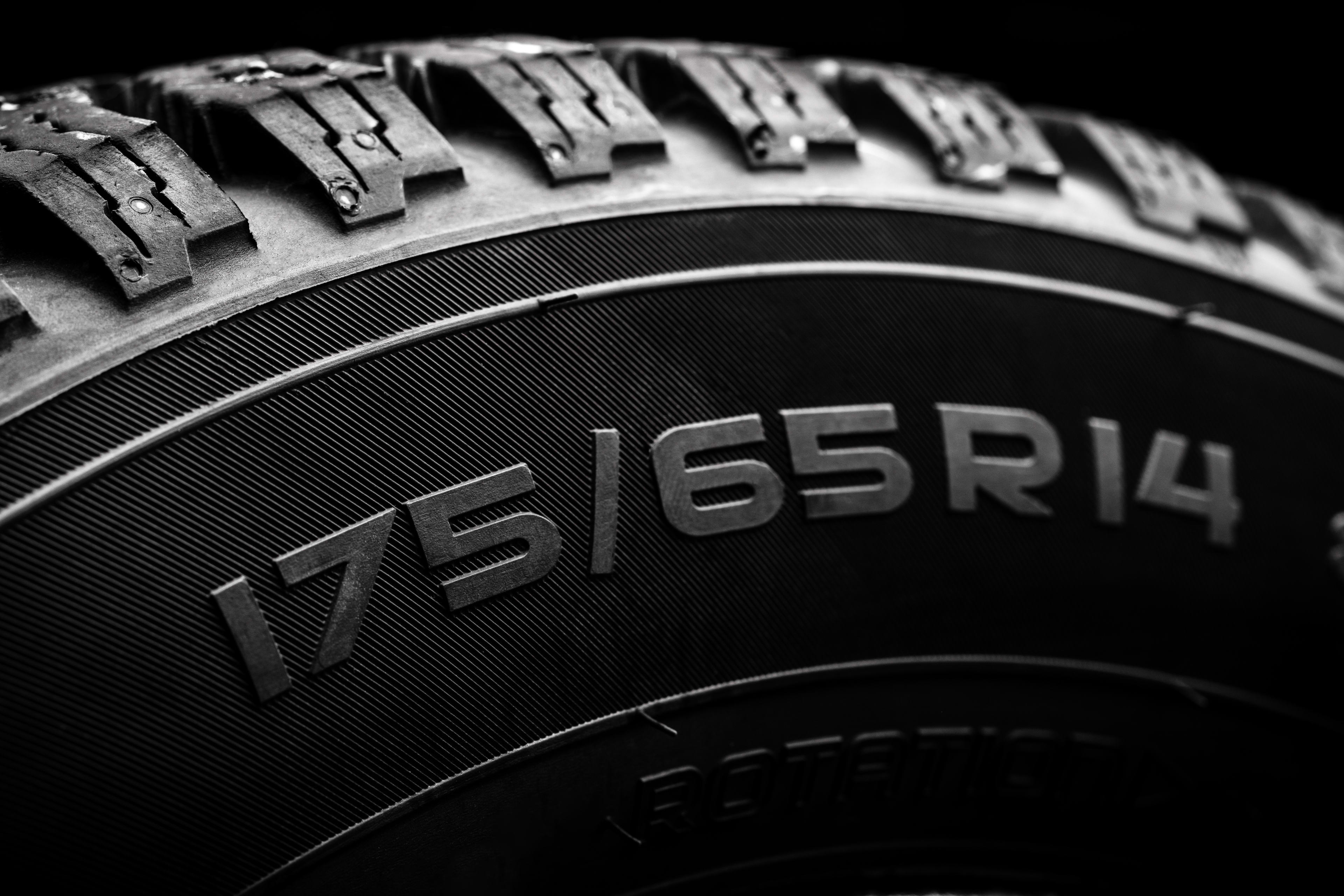 Close up of tire size markings and tread