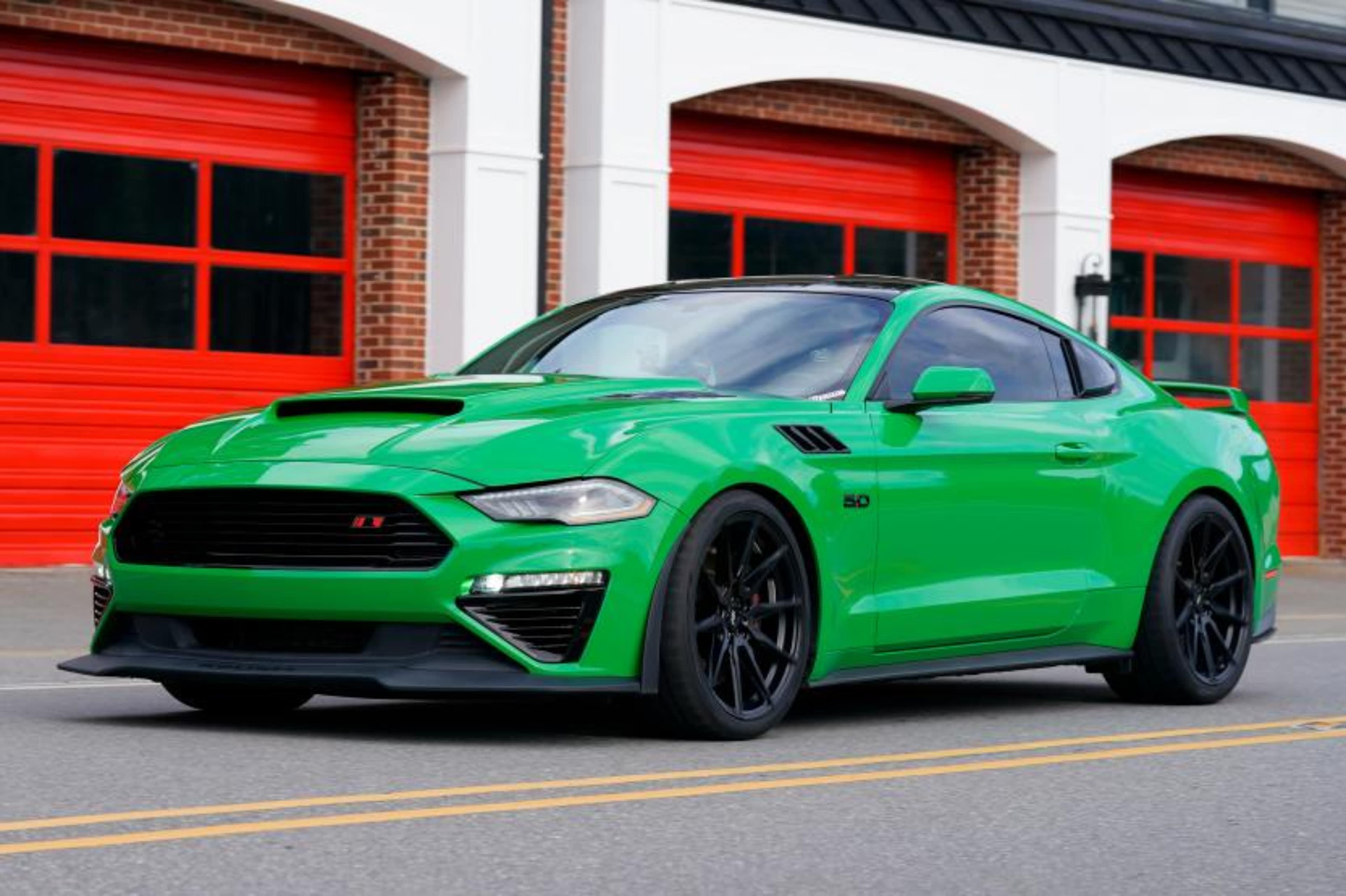 Continental ExtremeContact Sport 02 tires on a green Ford Mustang