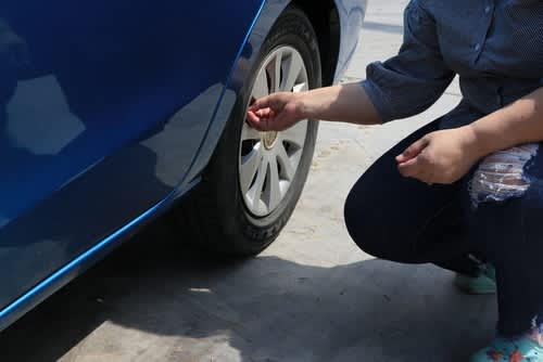 Man checking tires