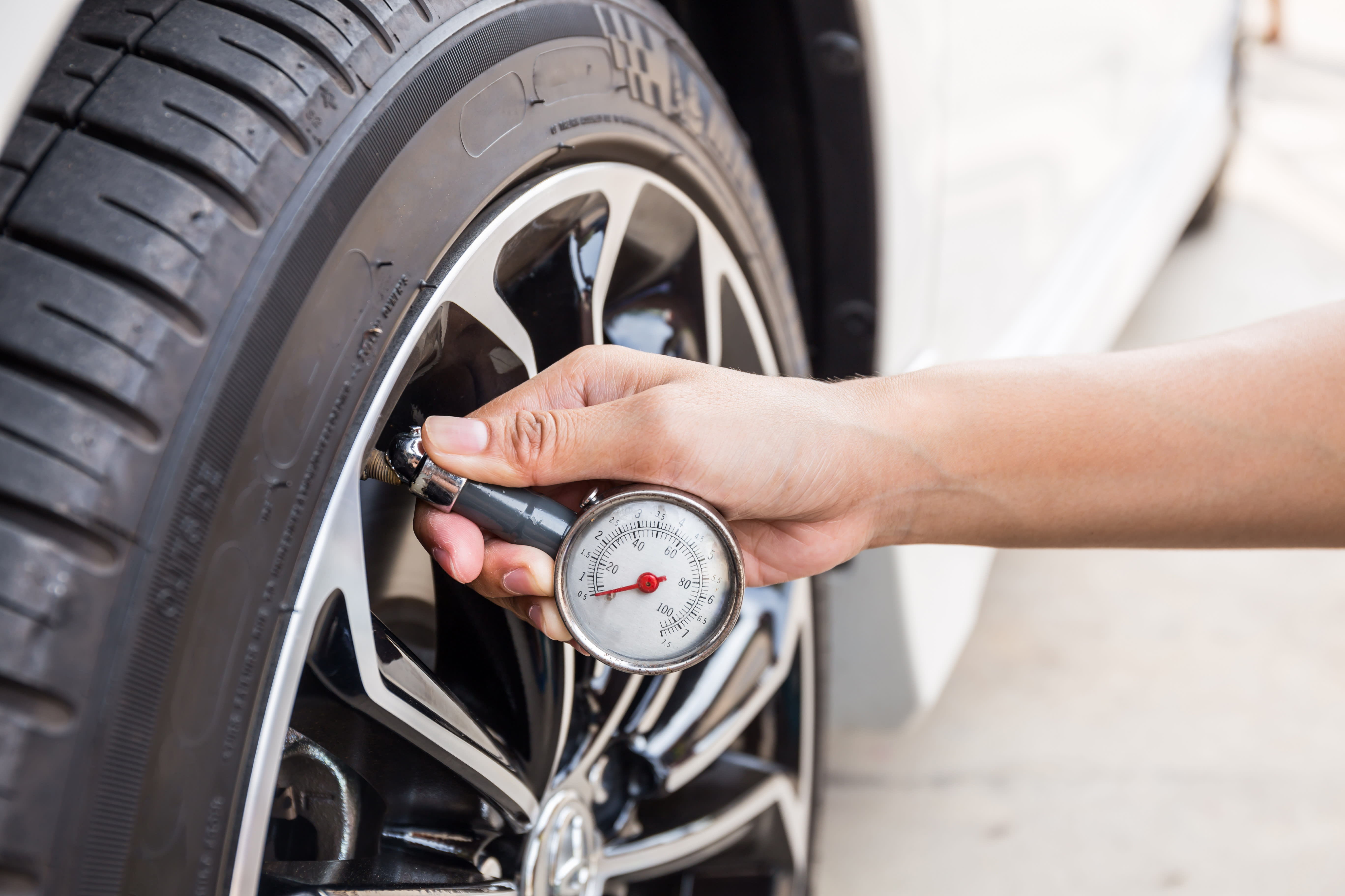 Checking Tire Pressure With a Tire Pressure Gauge