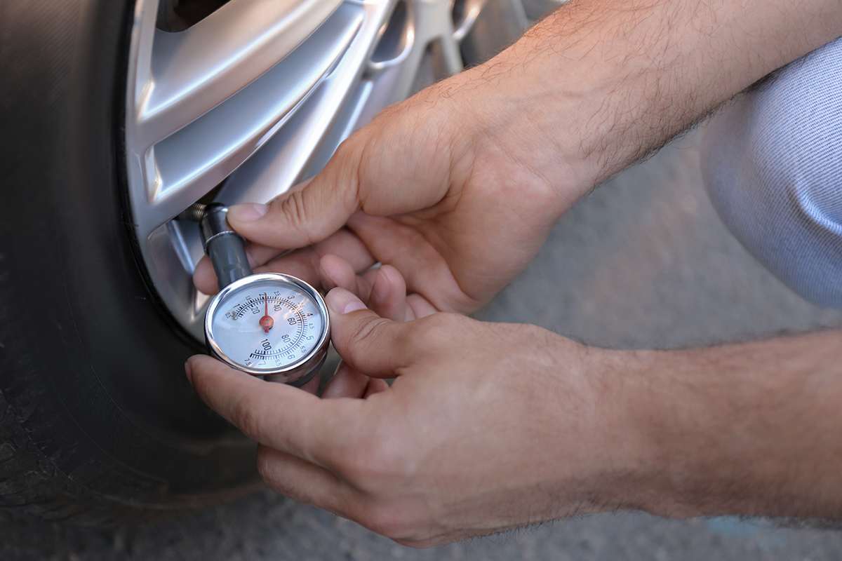 Using a tire pressure gauge