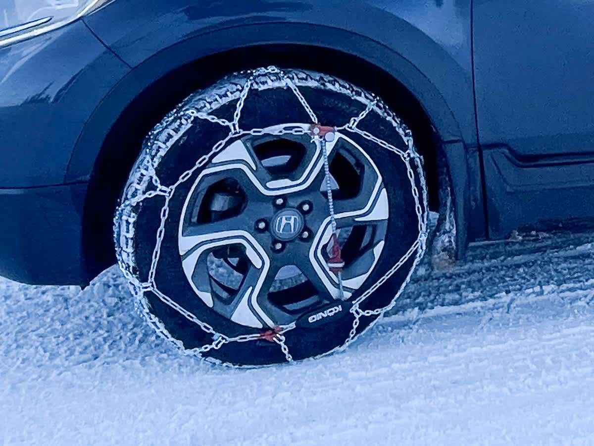 Tire with snow chains