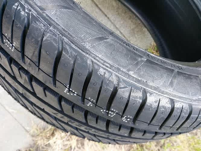 Is That White Film on My Tires Normal? Find Out Here!