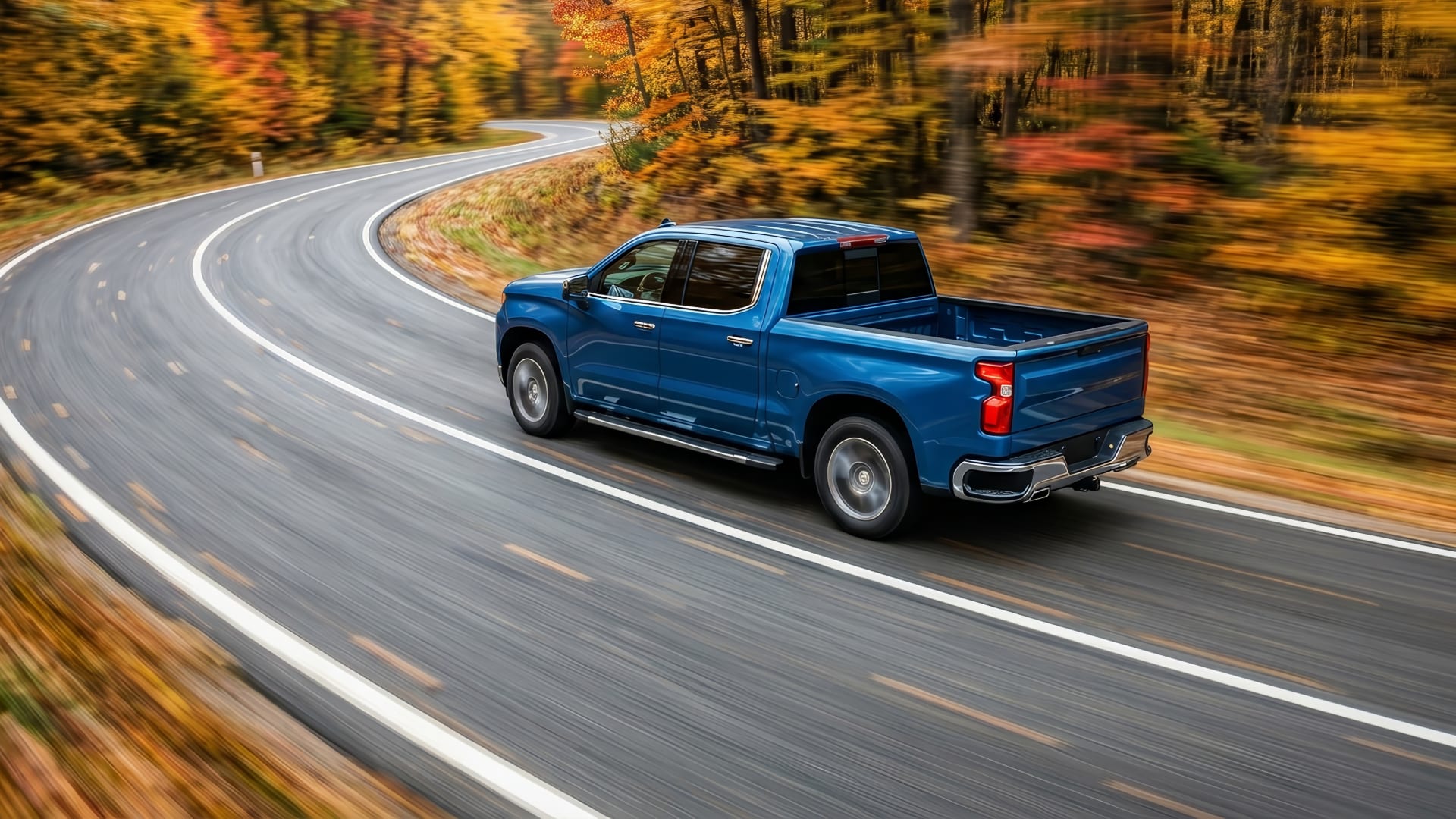Yokohama Geolandar H/T4 tires on a blue pickup truck